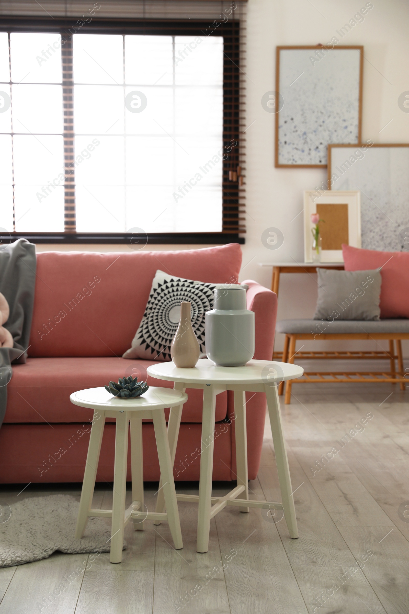 Photo of Interior of cozy living room with comfortable sofa