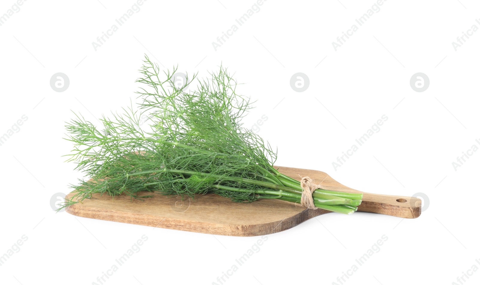 Photo of Wooden board with bunch of fresh dill isolated on white