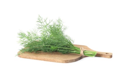 Wooden board with bunch of fresh dill isolated on white