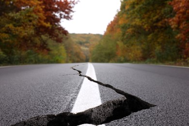 Image of Large crack on asphalt road after earthquake