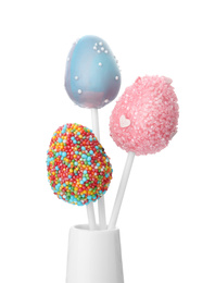 Delicious egg shaped cake pops on white background. Easter holiday