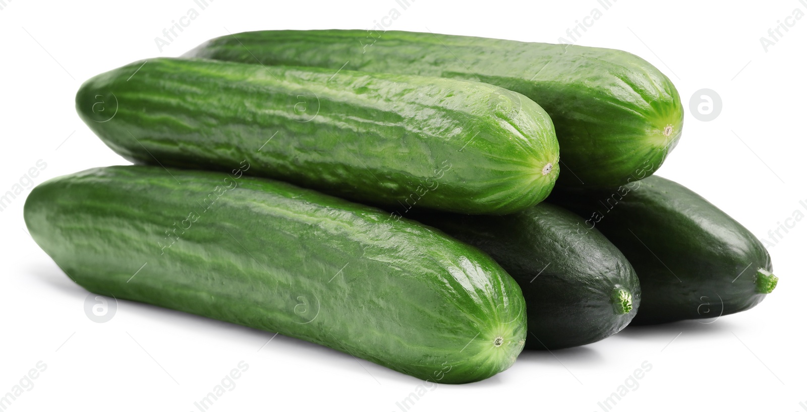 Photo of Many long fresh cucumbers isolated on white