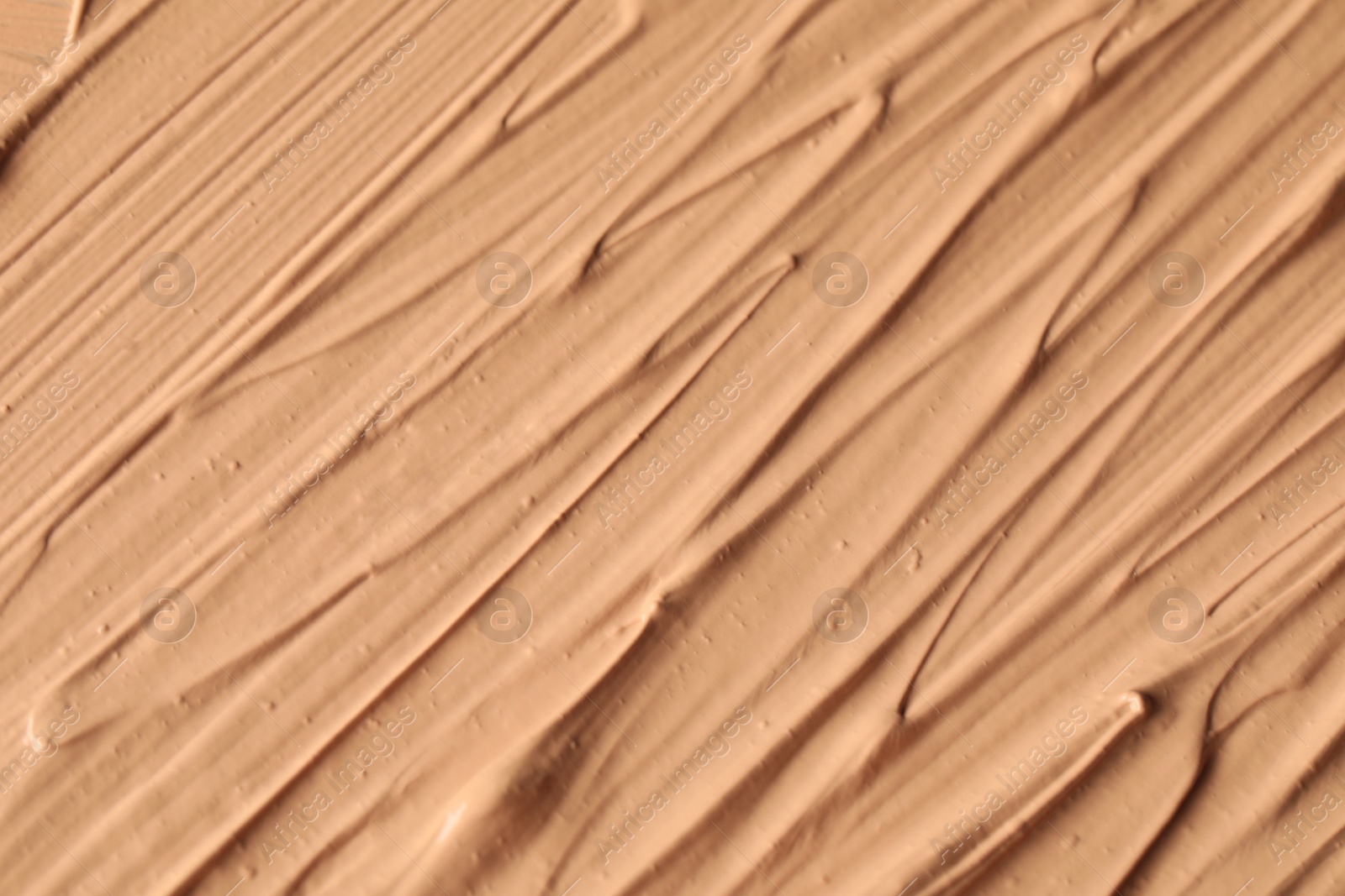 Photo of Texture of liquid skin foundation as background, closeup