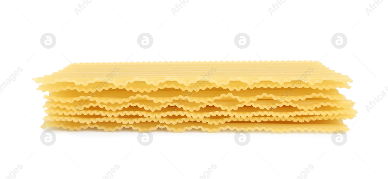 Photo of Stack of uncooked lasagna sheets isolated on white