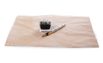 Photo of Inkwell, fountain pen and parchment on white background
