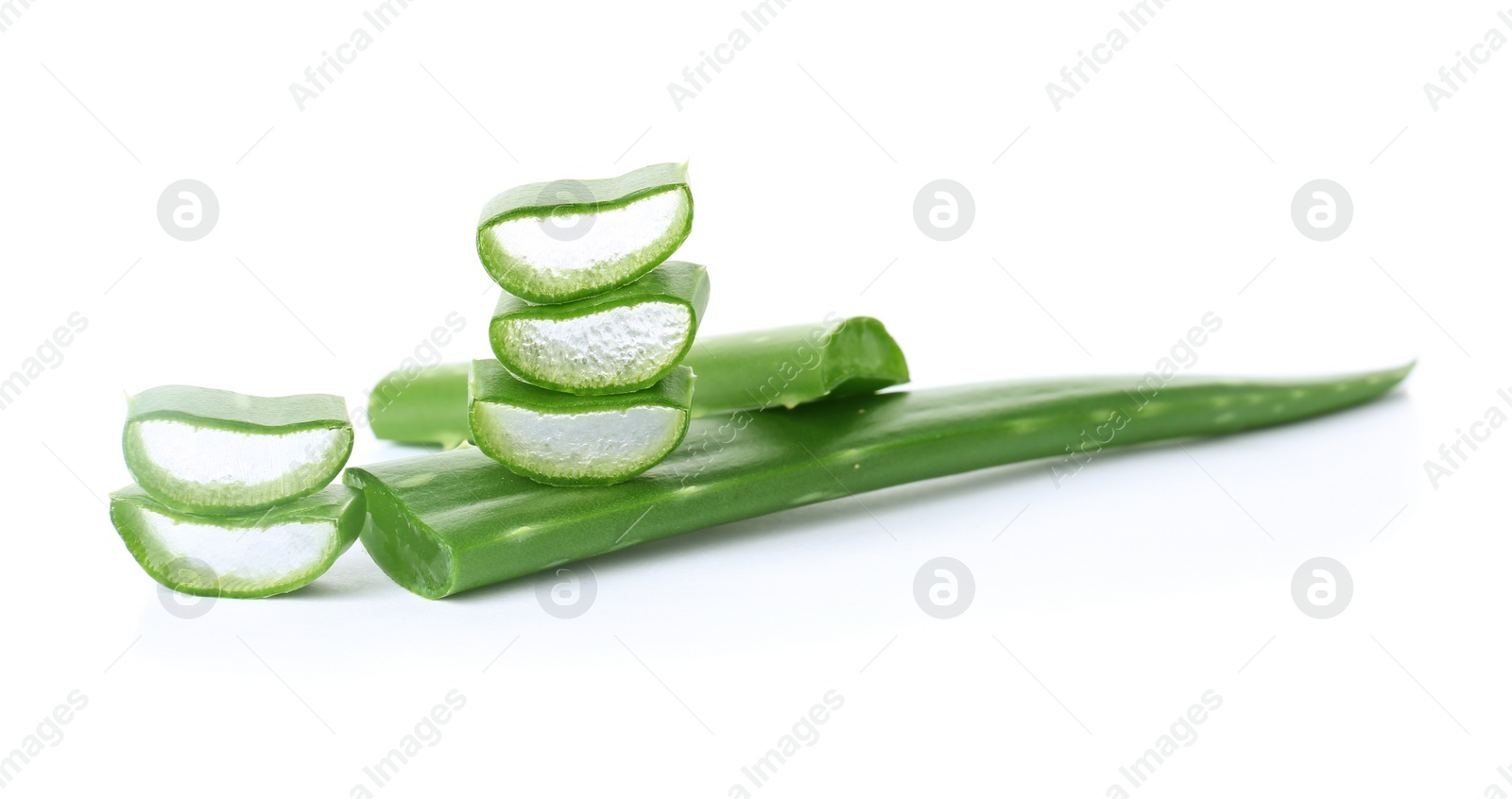 Photo of Fresh aloe vera leaf slices on white background