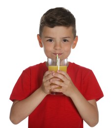 Photo of Little boy drinking juice on white background