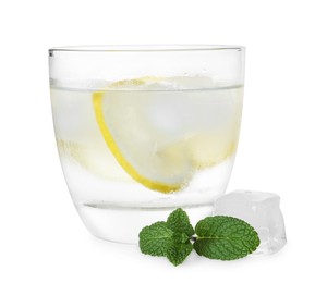Glass of vodka with ice, mint and lemon isolated on white