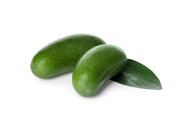 Fresh whole seedless avocados with leaf isolated on white