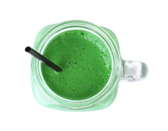 Photo of Mason jar with spirulina smoothie on white background, top view