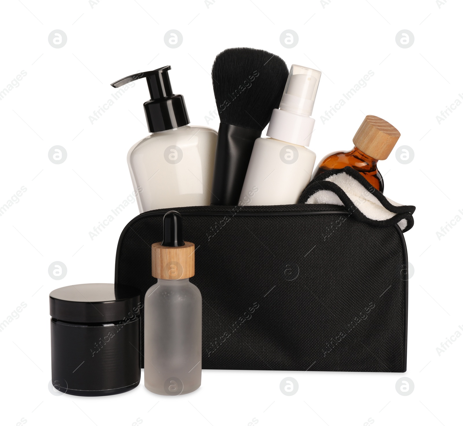 Photo of Preparation for spa. Compact toiletry bag and different cosmetic products isolated on white