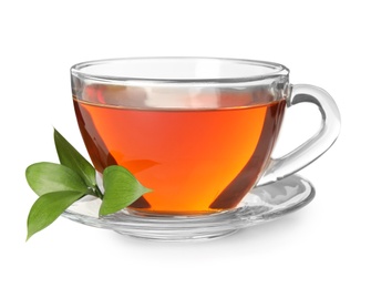 Glass cup of hot aromatic tea on white background