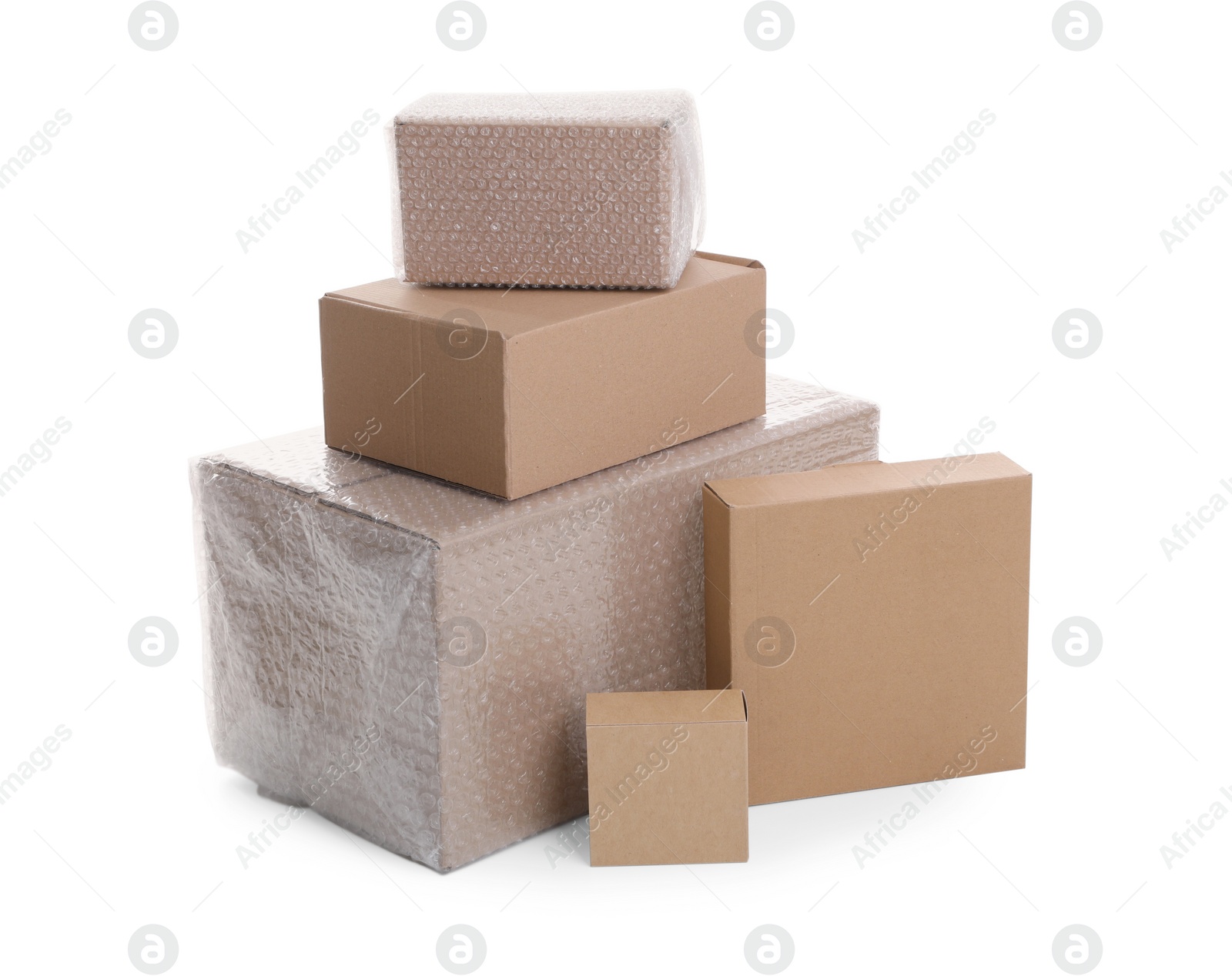 Photo of Cardboard boxes packed in bubble wrap and ordinary ones on white background