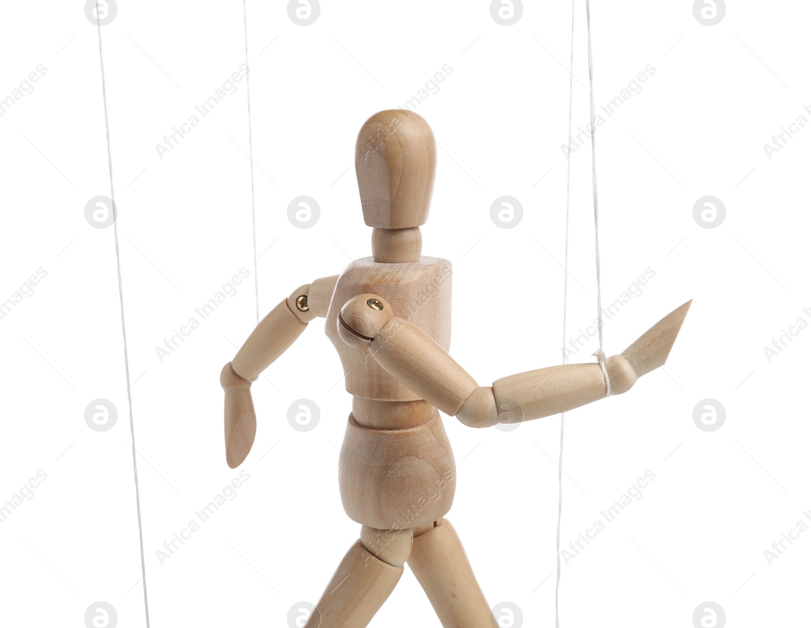 Photo of One wooden puppet with strings on white background