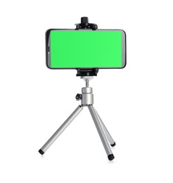 Image of Smartphone with green screen fixed to tripod on white background. Mockup for design