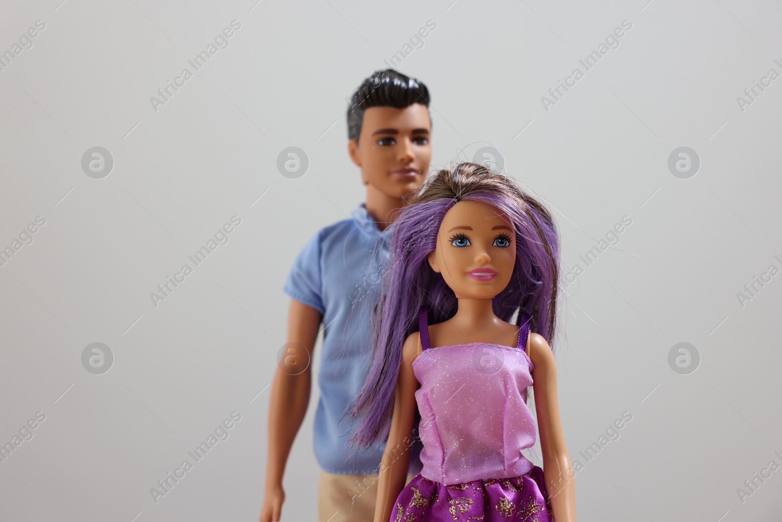 Photo of Leiden, Netherlands - September 20, 2023: Stylish Barbie and Ken dolls on light gray background, selective focus
