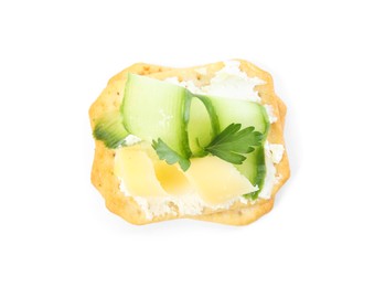 Photo of Delicious cracker with cream cheese, cucumber and parsley isolated on white, top view