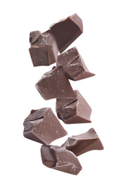 Image of Delicious chocolate chunks falling on white background