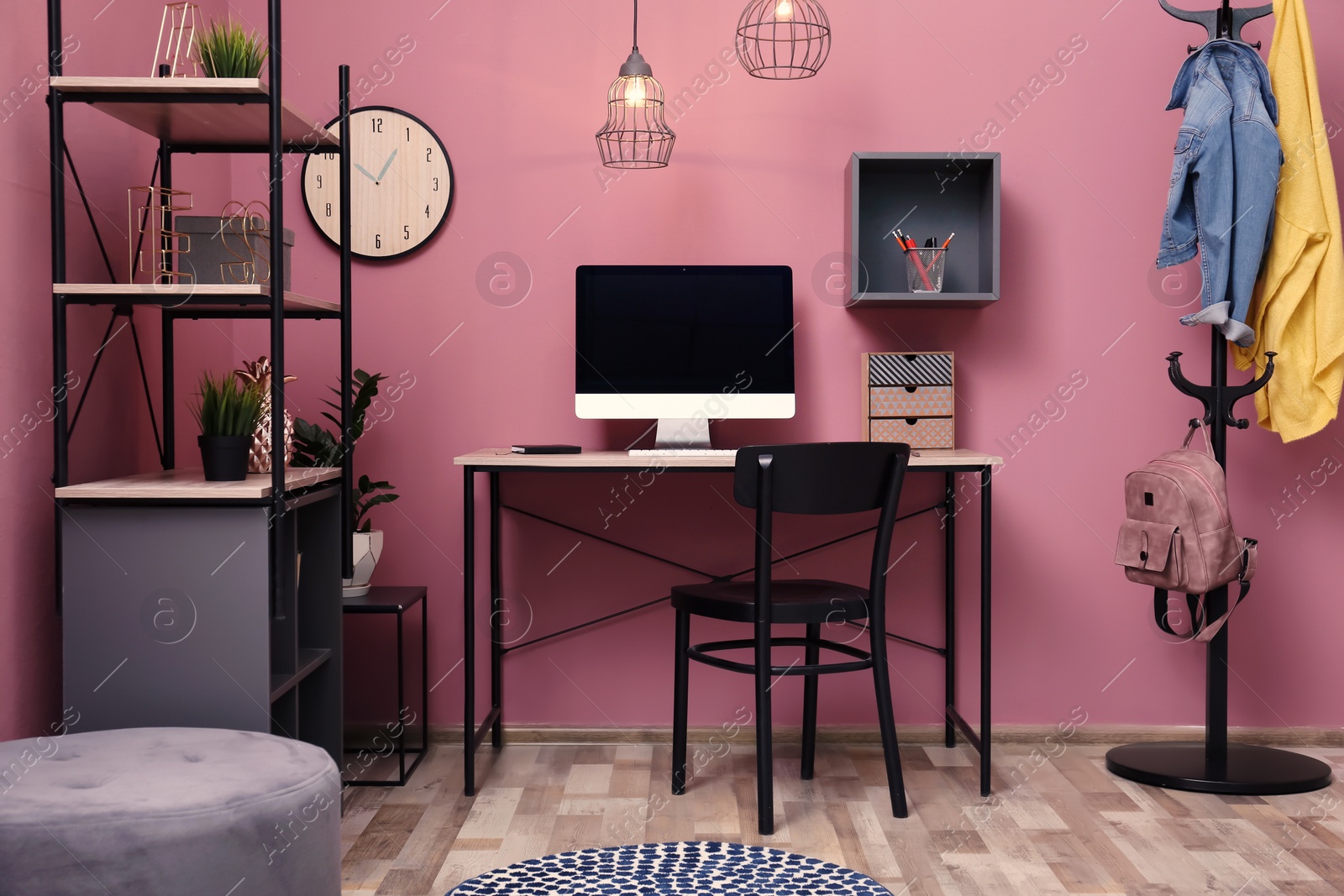 Photo of Comfortable workplace with computer on desk in home office