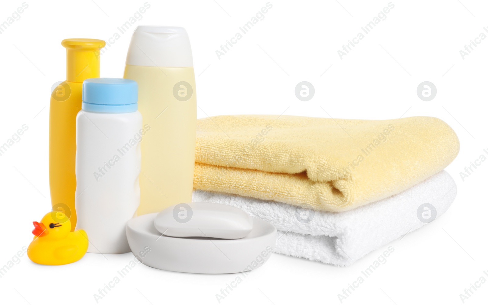 Photo of Baby cosmetic products, bath duck and towels isolated on white