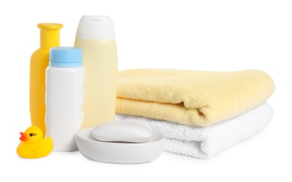 Photo of Baby cosmetic products, bath duck and towels isolated on white