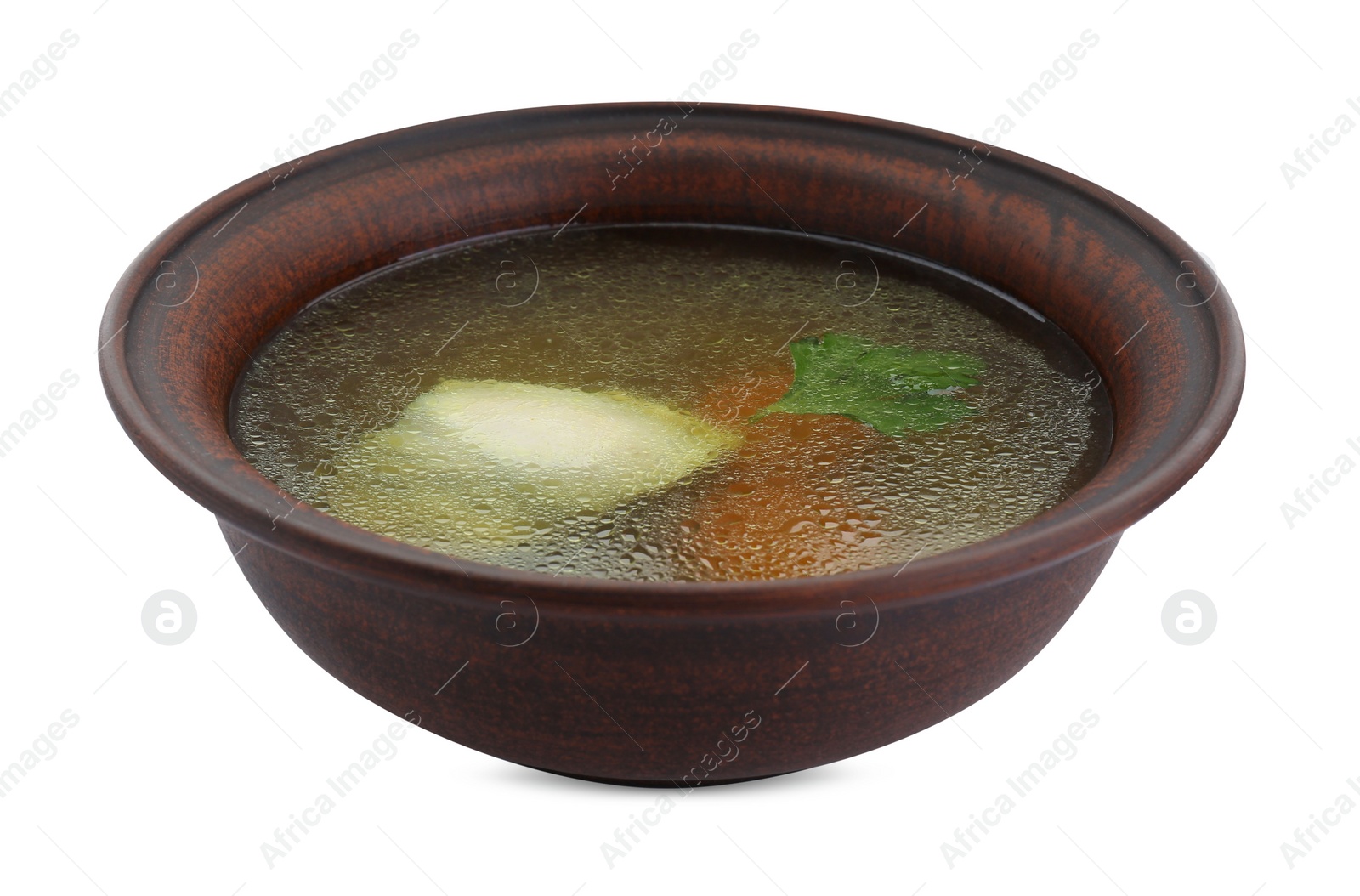 Photo of Delicious chicken bouillon with carrot and parsley in bowl on white background