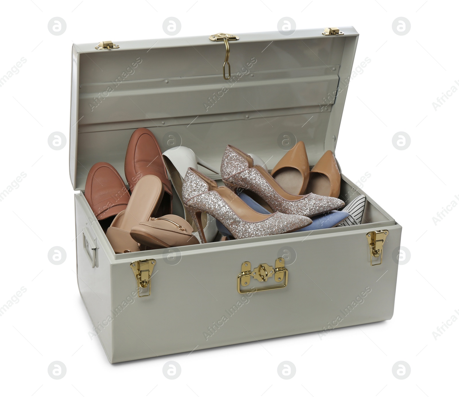 Photo of Stylish storage trunk with women shoes isolated on white. Interior element