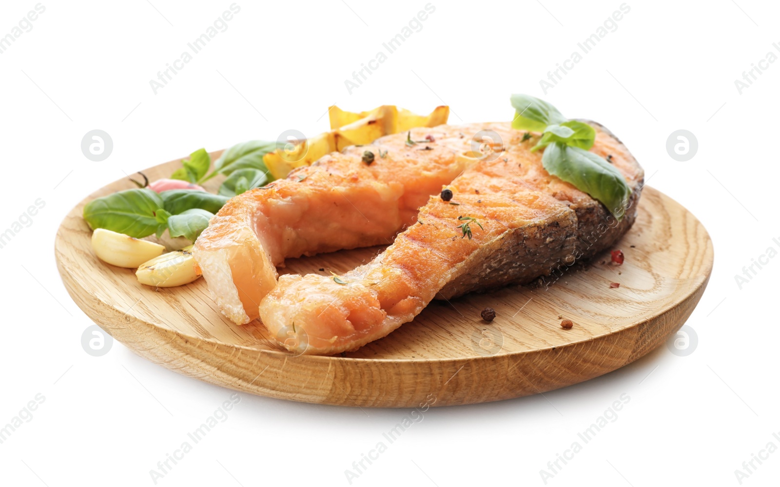 Photo of Plate with tasty salmon steak on white background