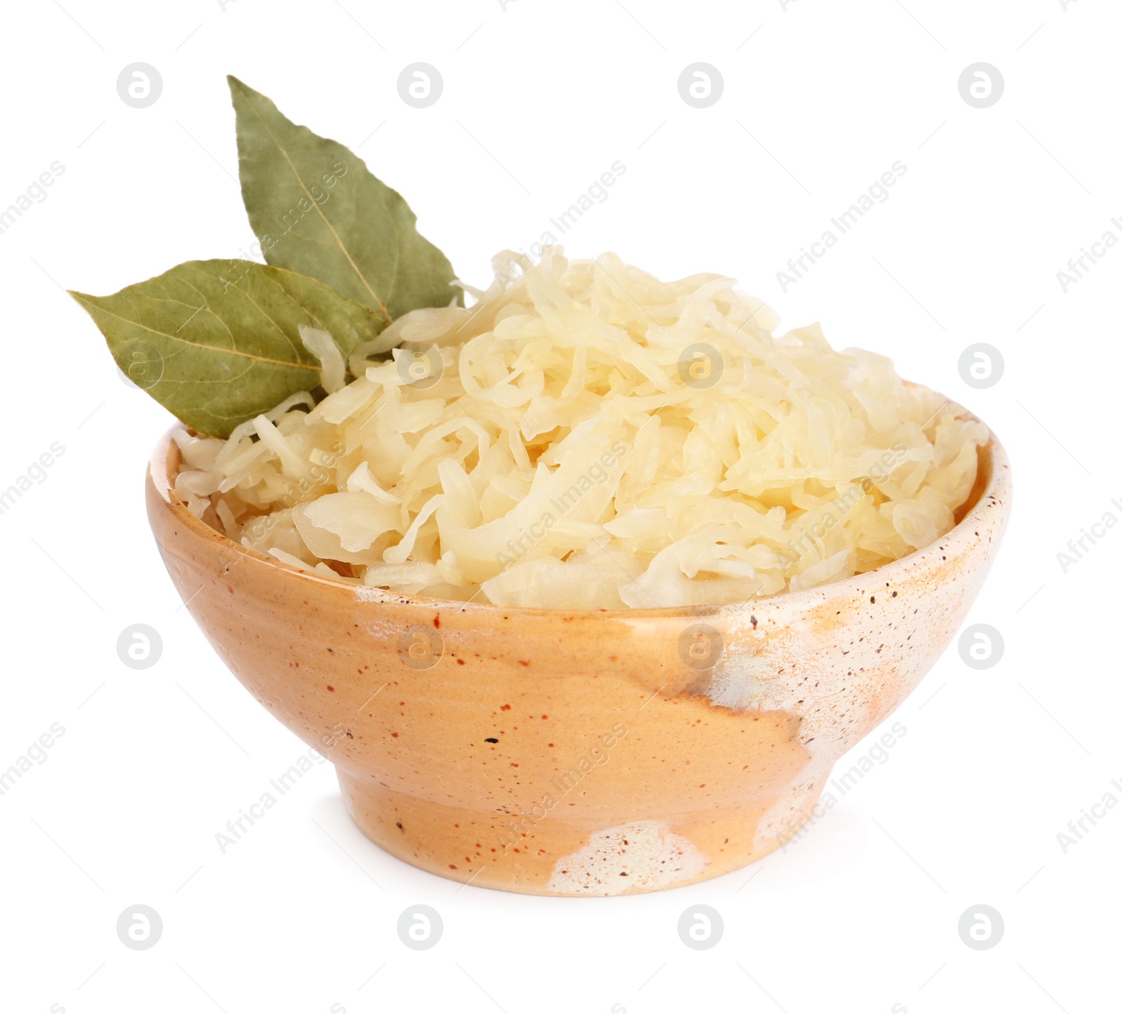 Photo of Bowl of tasty sauerkraut with bay leaves on white background