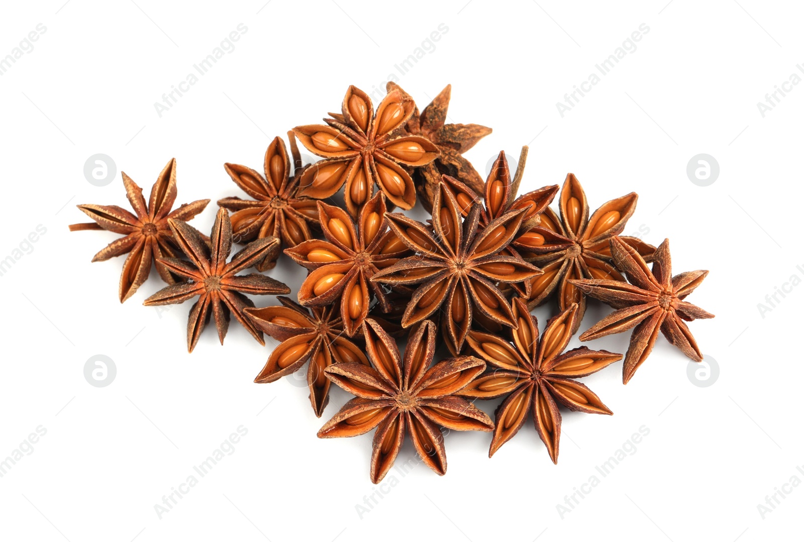 Photo of Dry anise stars with seeds on white background