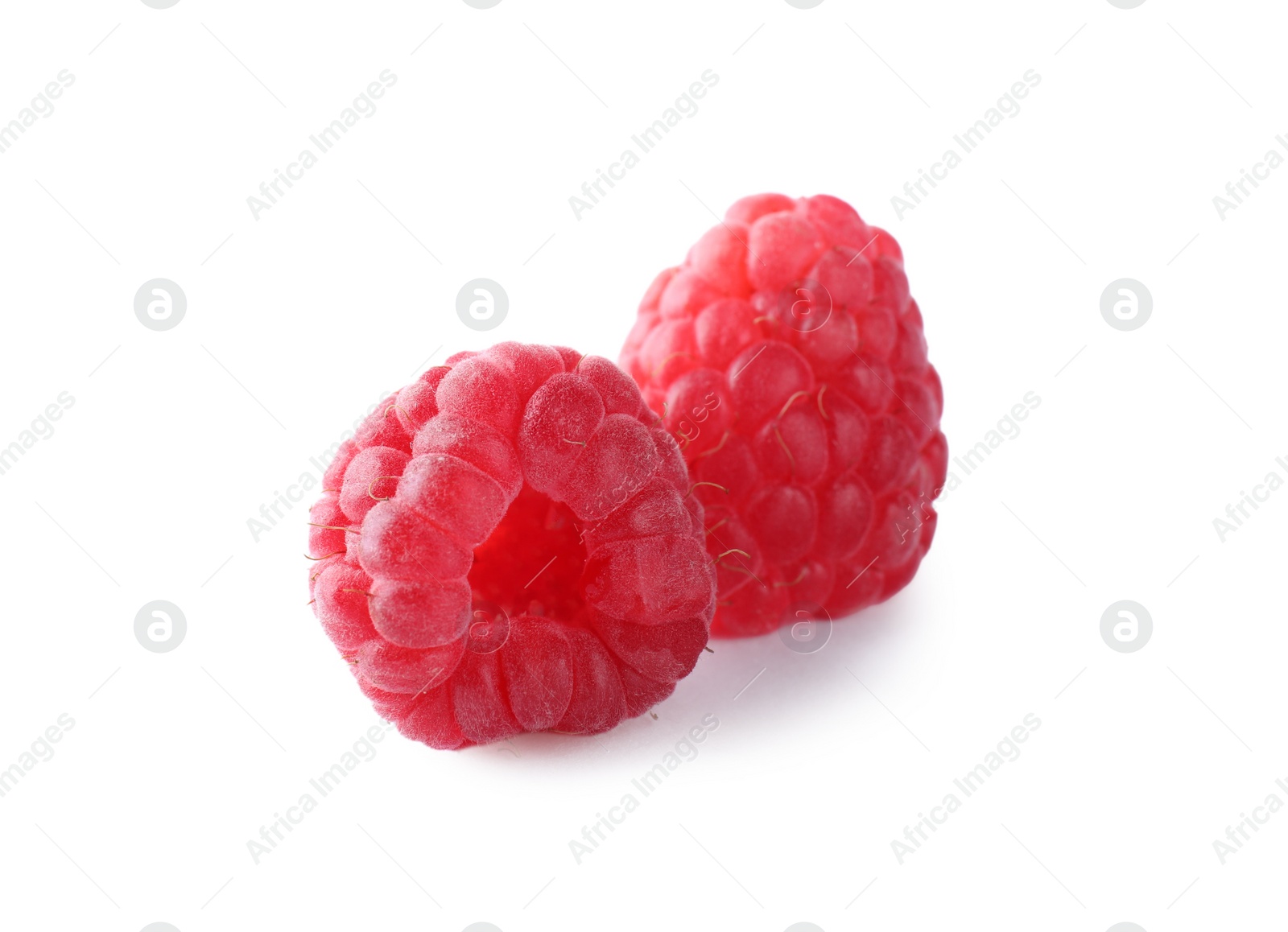 Photo of Delicious sweet ripe raspberries isolated on white