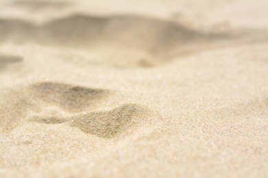 Photo of Closeup view of clean beach sand outdoors