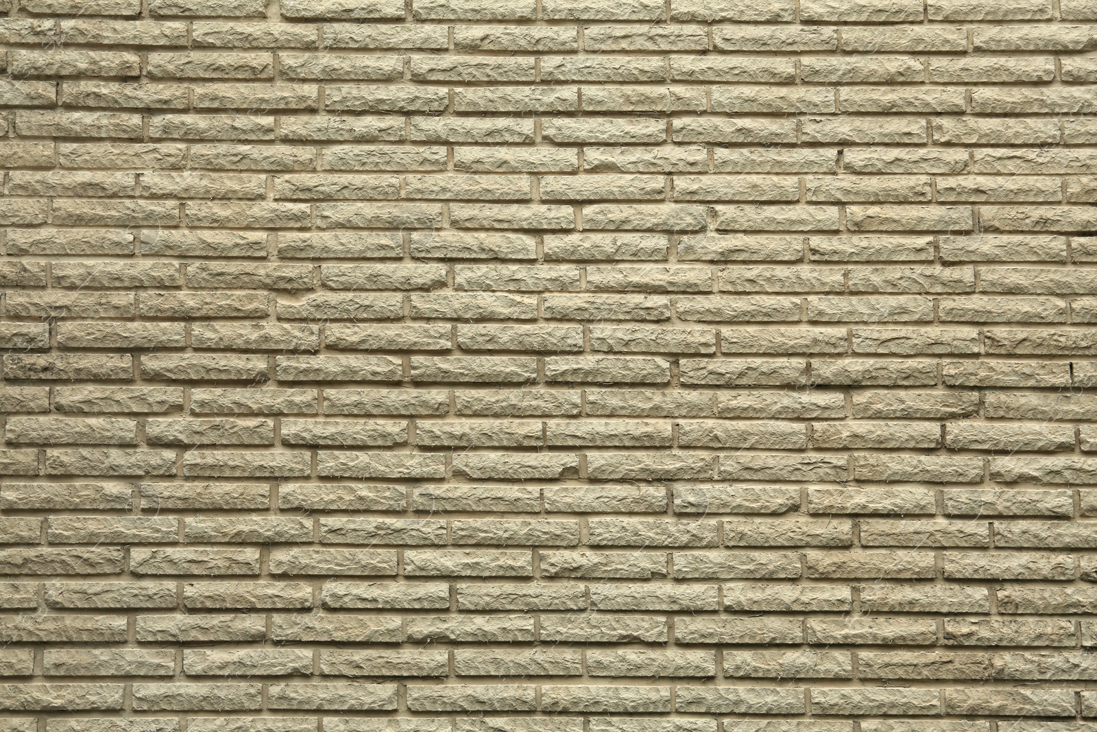 Photo of Texture of brick wall as background, closeup