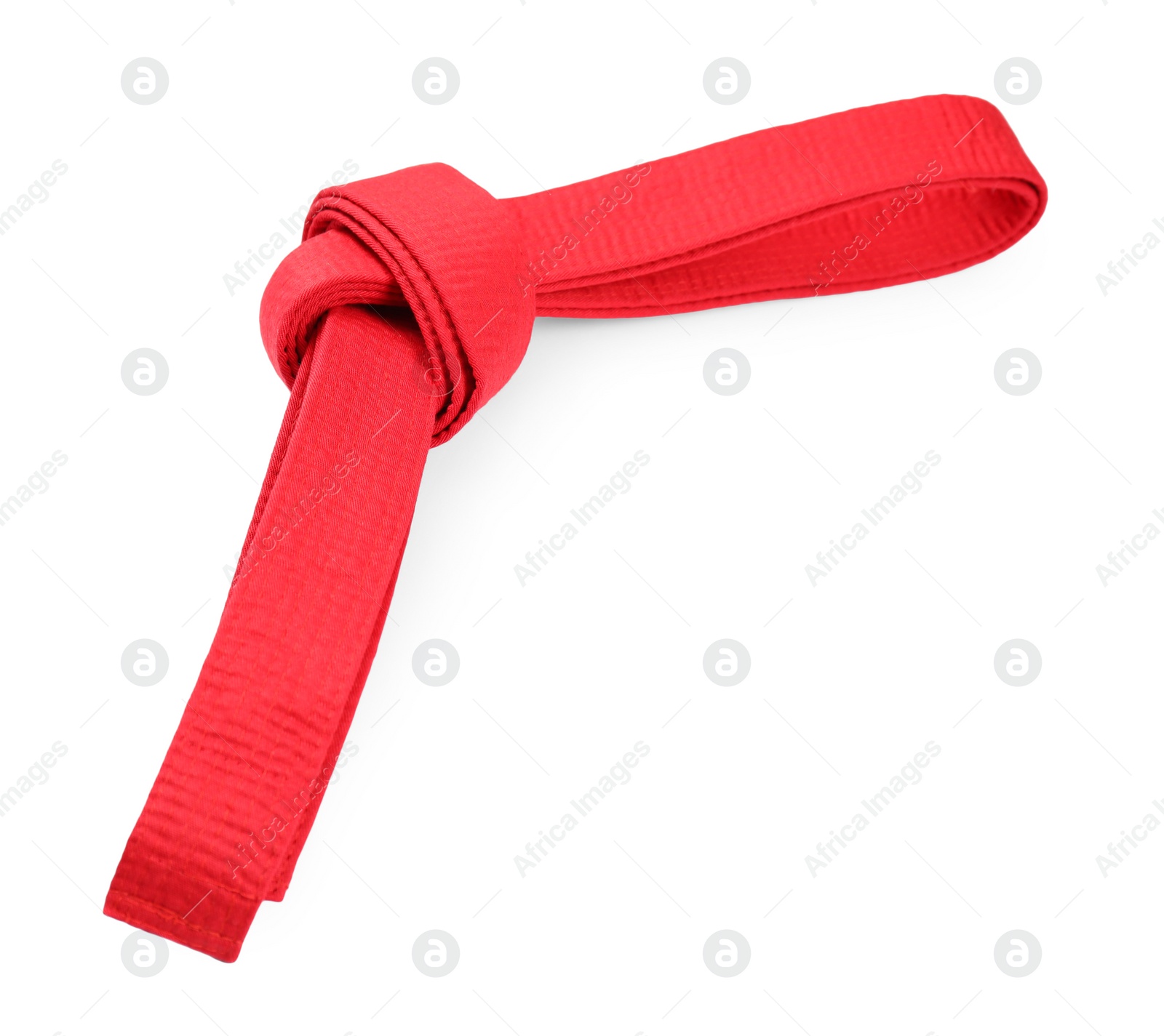 Photo of Red karate belt isolated on white. Martial arts uniform