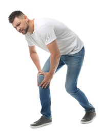 Photo of Full length portrait of man having knee problems on white background