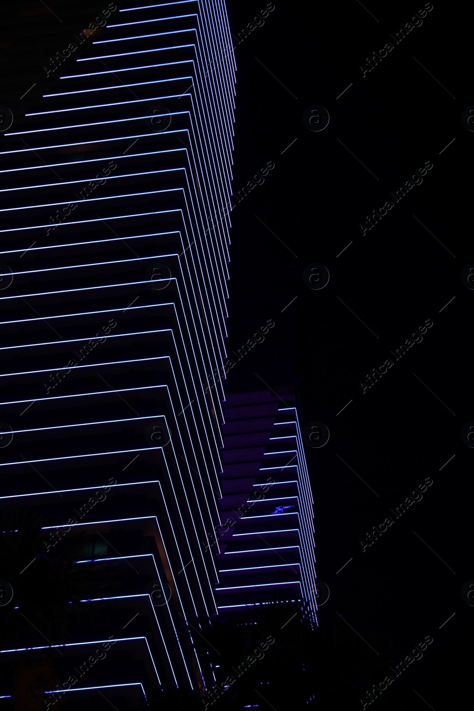 Photo of BATUMI, GEORGIA - JUNE 09, 2022: View of night cityscape with illuminated buildings