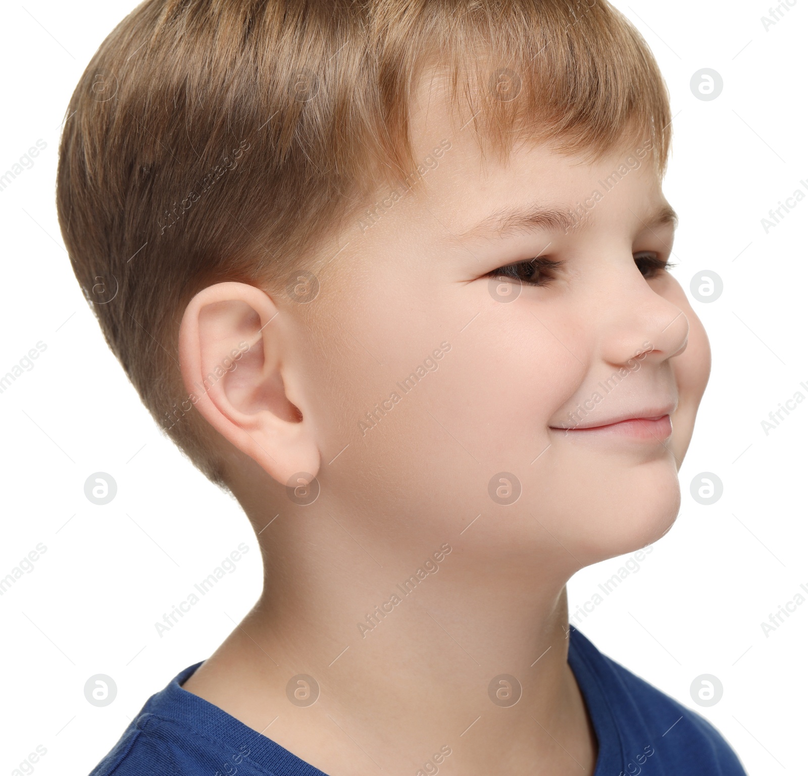 Photo of Portrait of cute little boy on white background