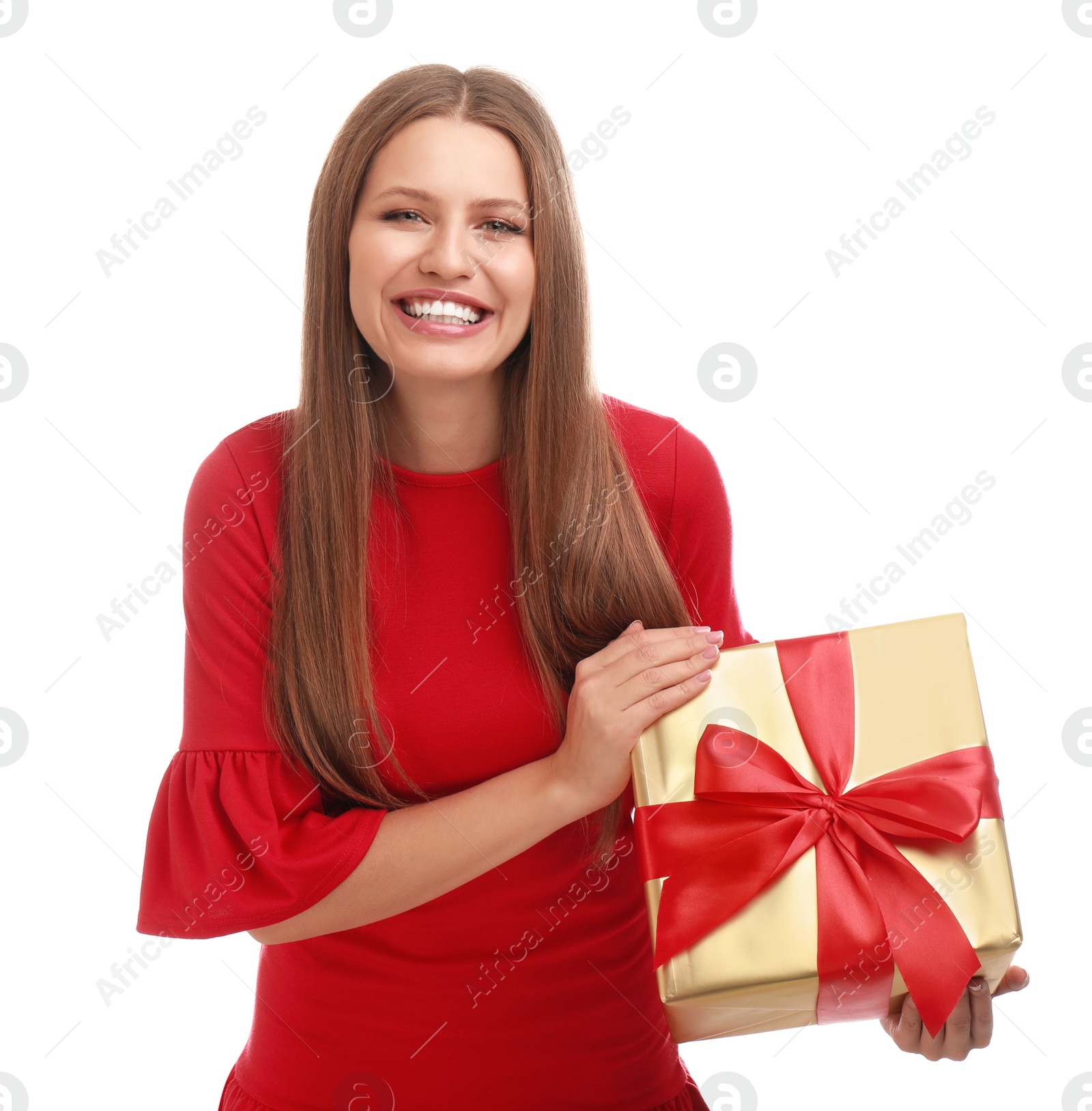 Photo of Happy young woman with Christmas gift on white background