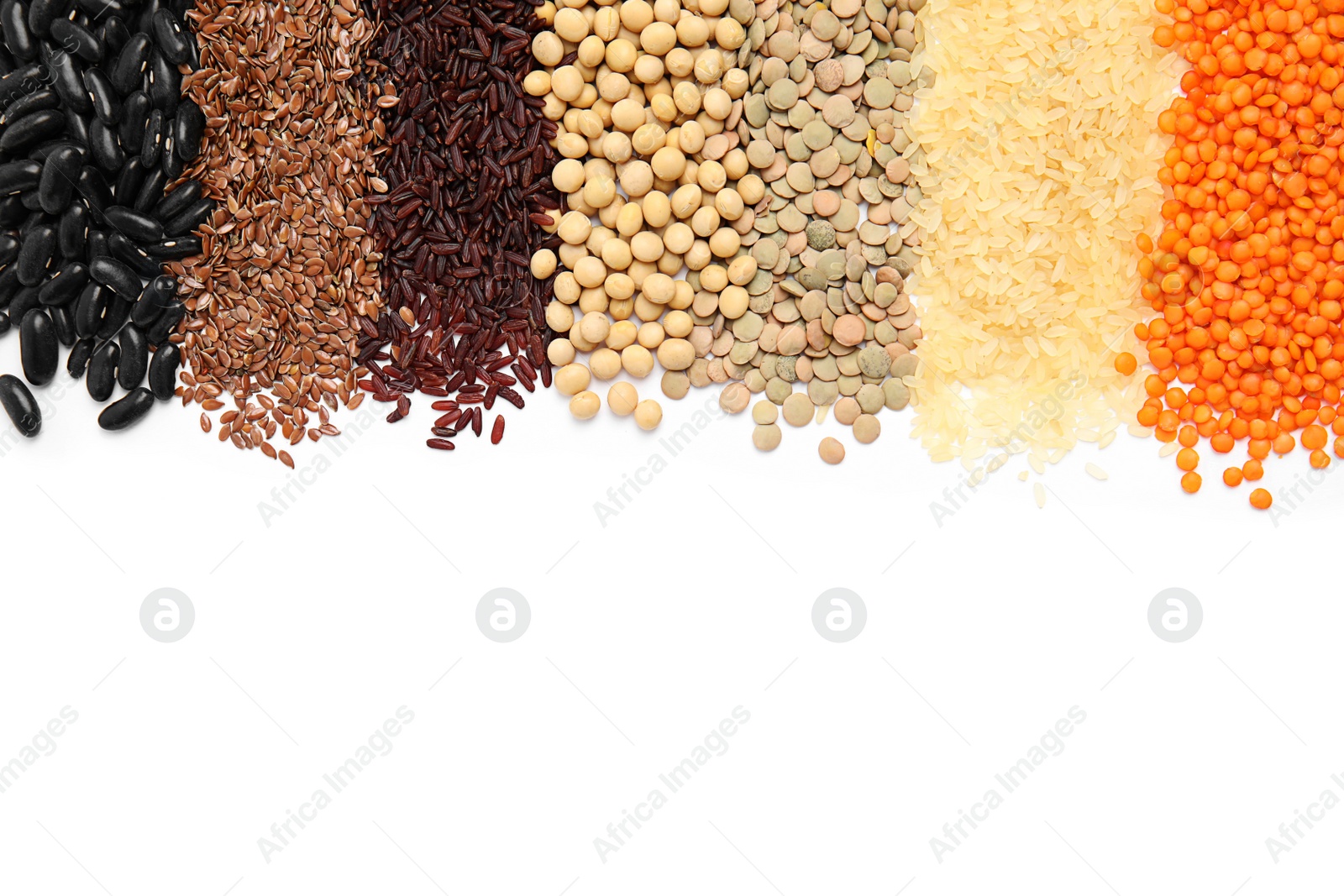 Photo of Various raw veggie seeds on white background, top view