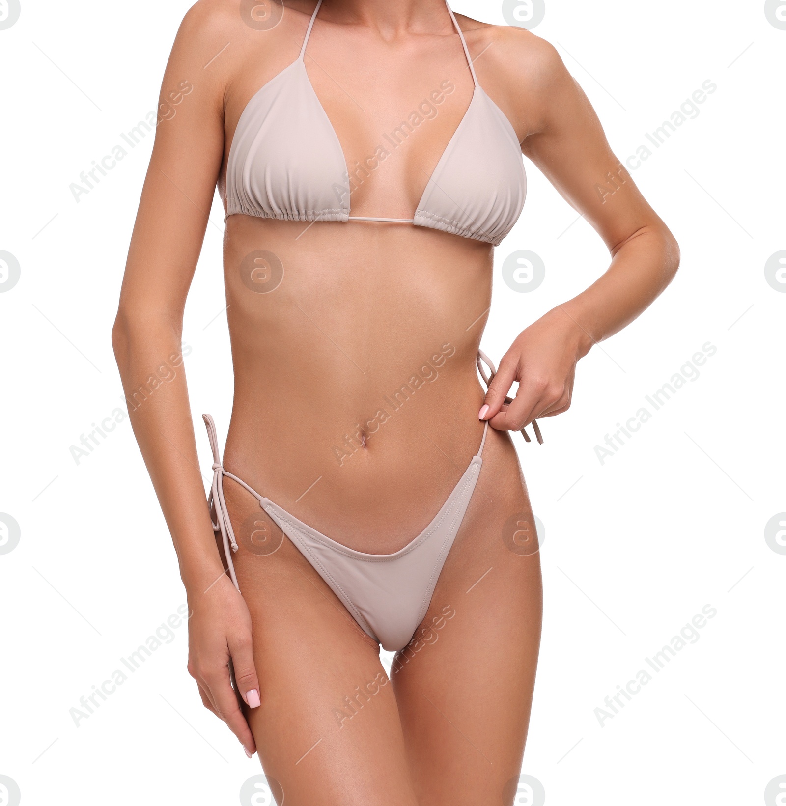 Photo of Young woman in stylish bikini isolated on white, closeup