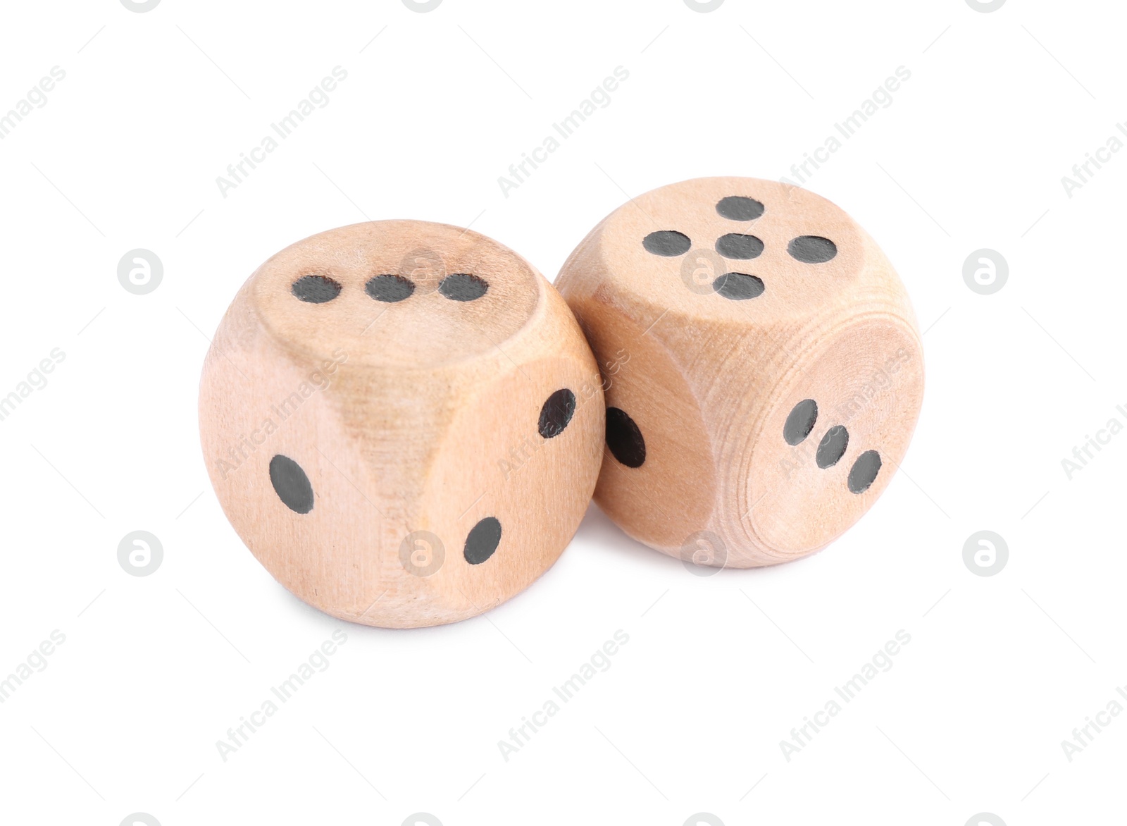 Photo of Two wooden game dices isolated on white