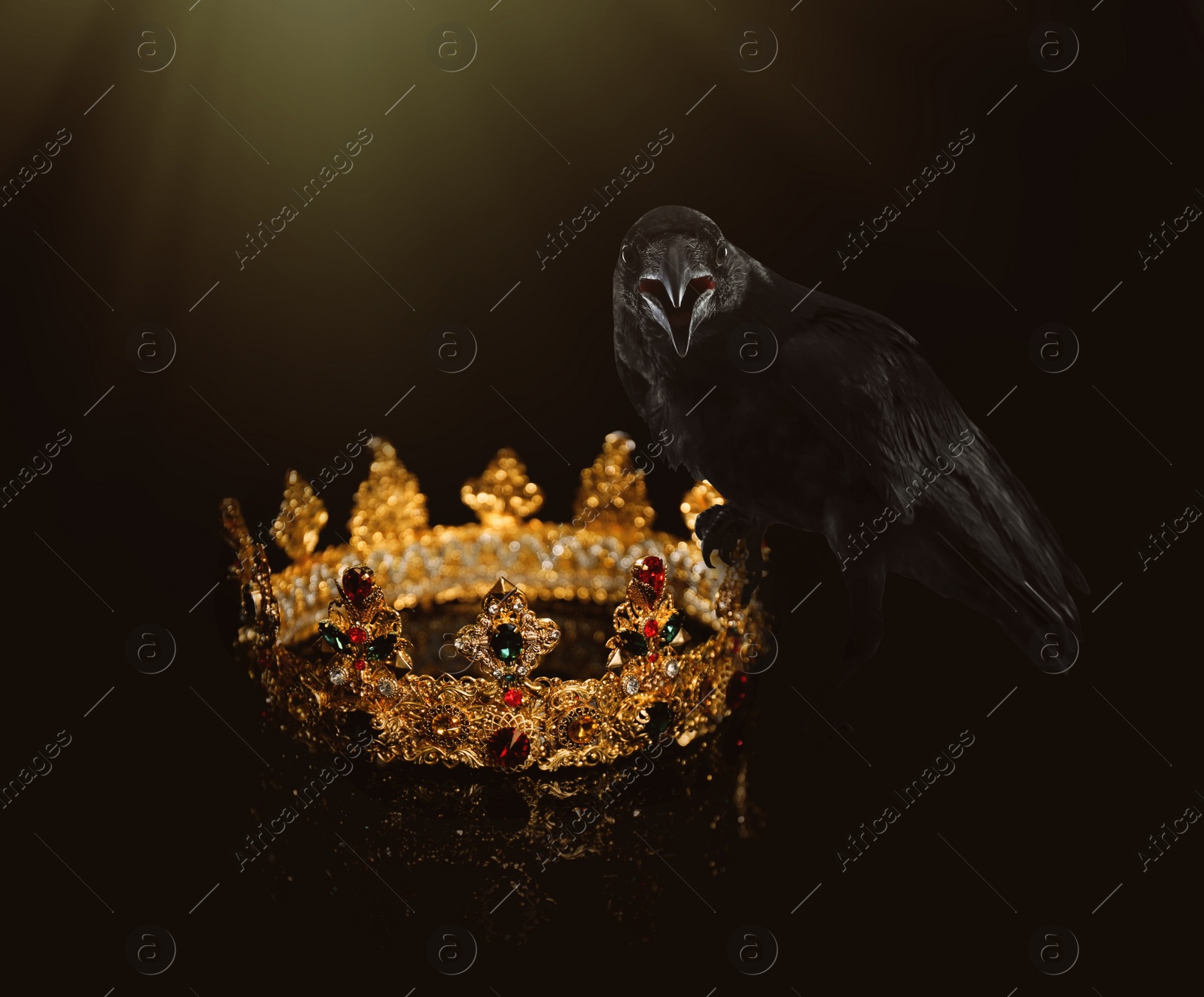 Image of Fantasy world. Black crow lit by magic light sitting on golden crown 