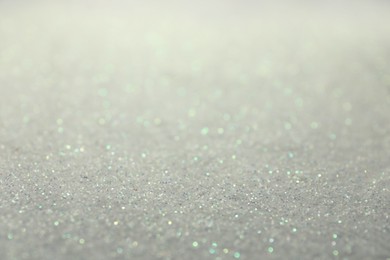 Shiny white glitter as background. Bokeh effect
