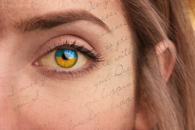 Image of Double exposure of young woman and text, closeup view of eye with Ukrainian flag reflection