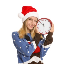 Photo of Woman in Santa hat with clock on white background. New Year countdown