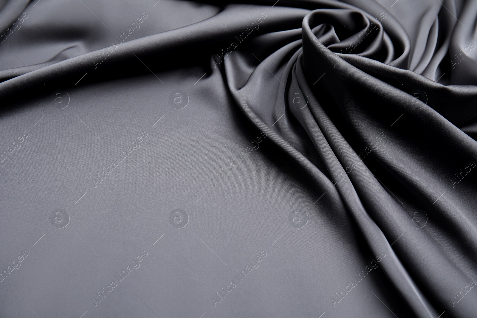 Photo of Texture of delicate black silk as background, closeup