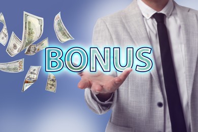 Man holding word Bonus and money flying to him on blue background, closeup