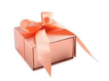 Gift box decorated with satin ribbon and bow on white background