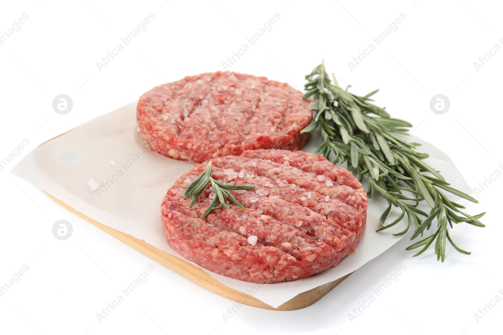Photo of Raw hamburger patties with rosemary and salt on white background