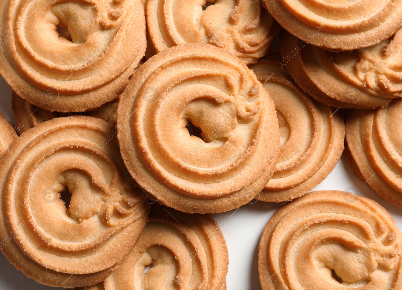 Photo of Plate with tasty Danish butter cookies, closeup